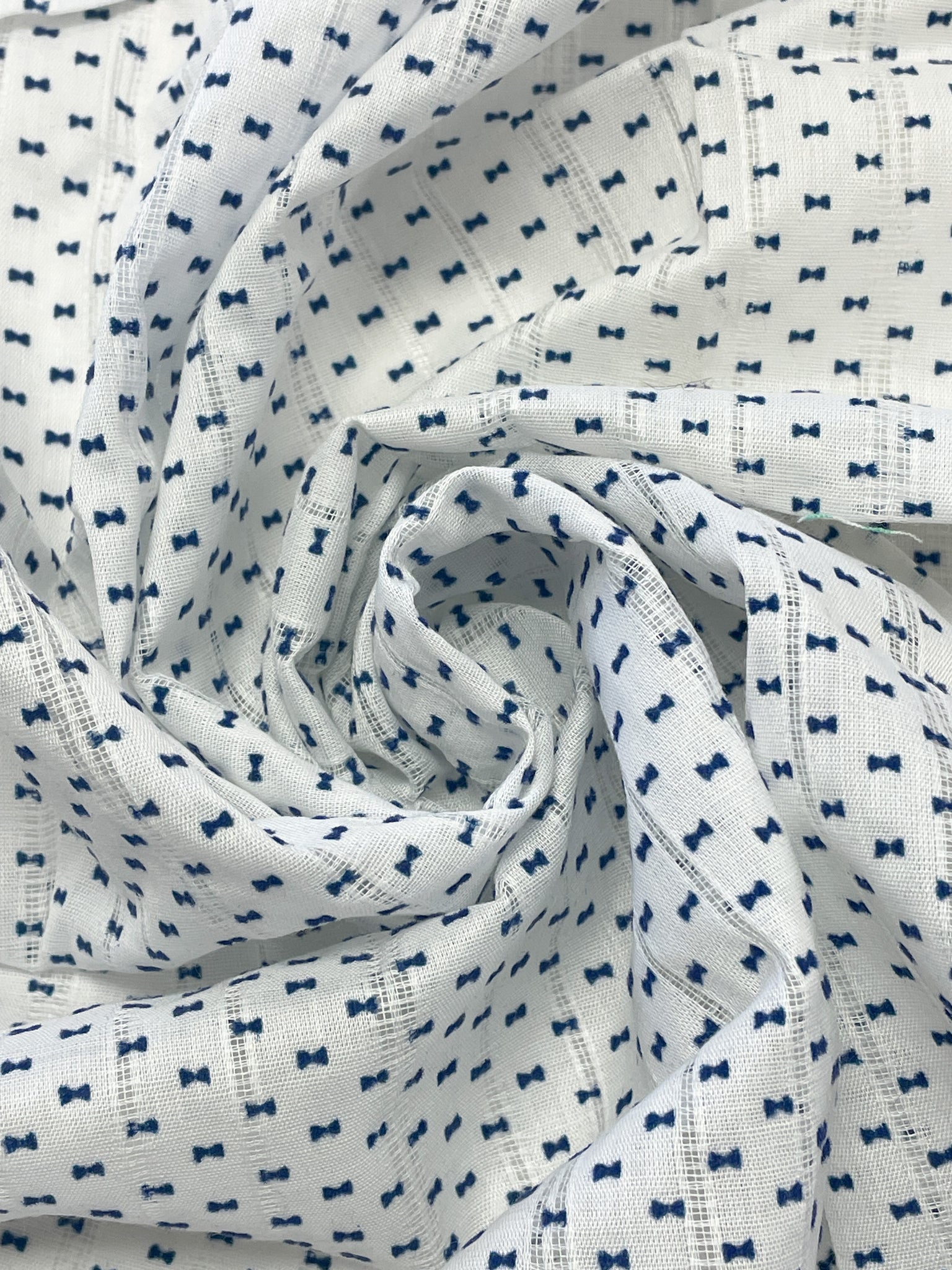 Cotton Blend Voile Remnant - White with Blue Flocked Bows