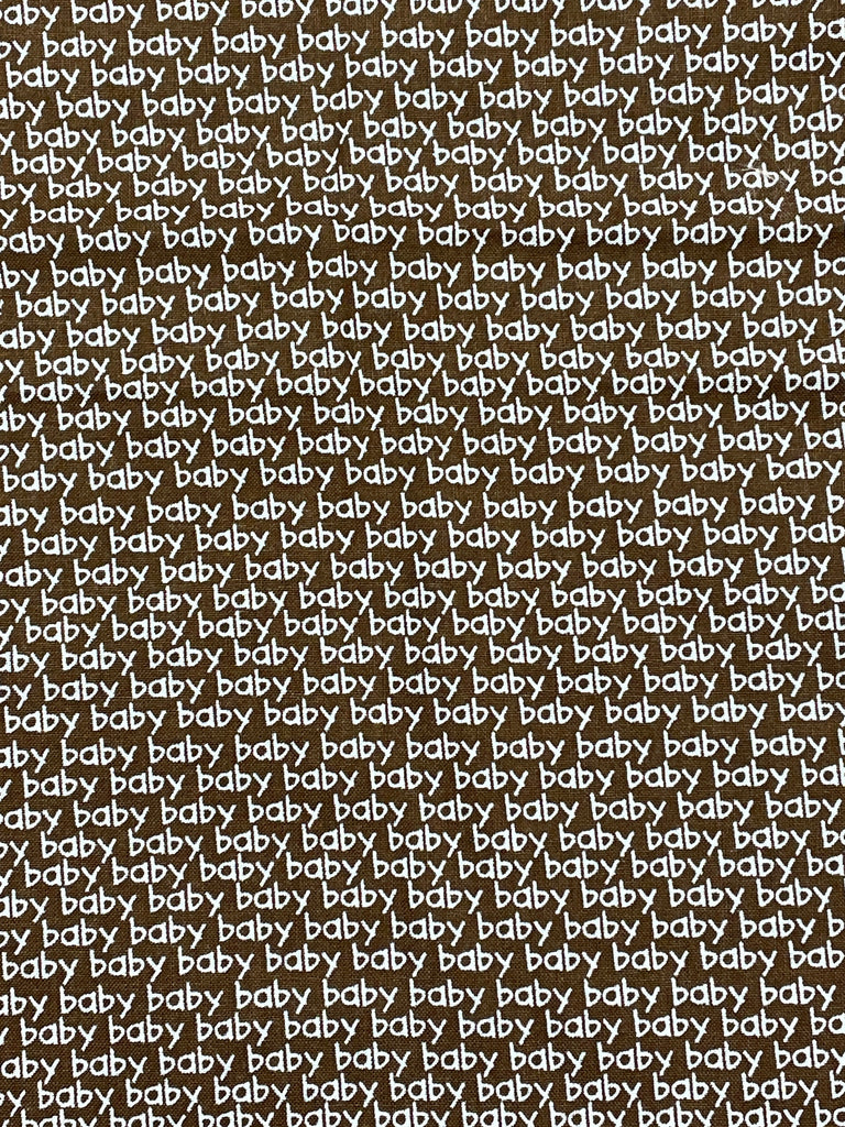 1 YD Quilting Cotton - Brown with "Baby" in White
