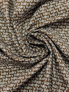 1 YD Quilting Cotton - Brown with "Baby" in White