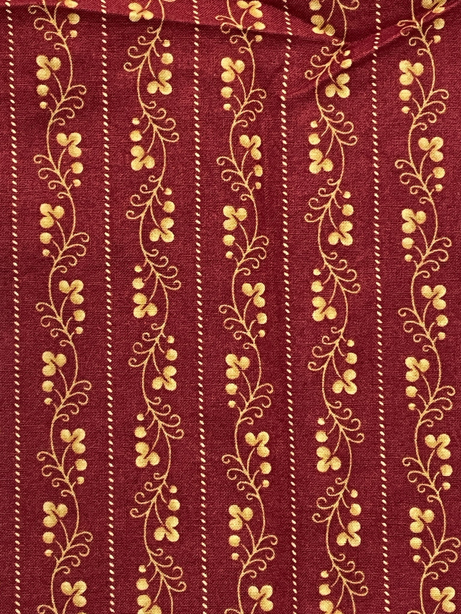 1 YD Quilting Cotton - Maroon with Dark Yellow Berries