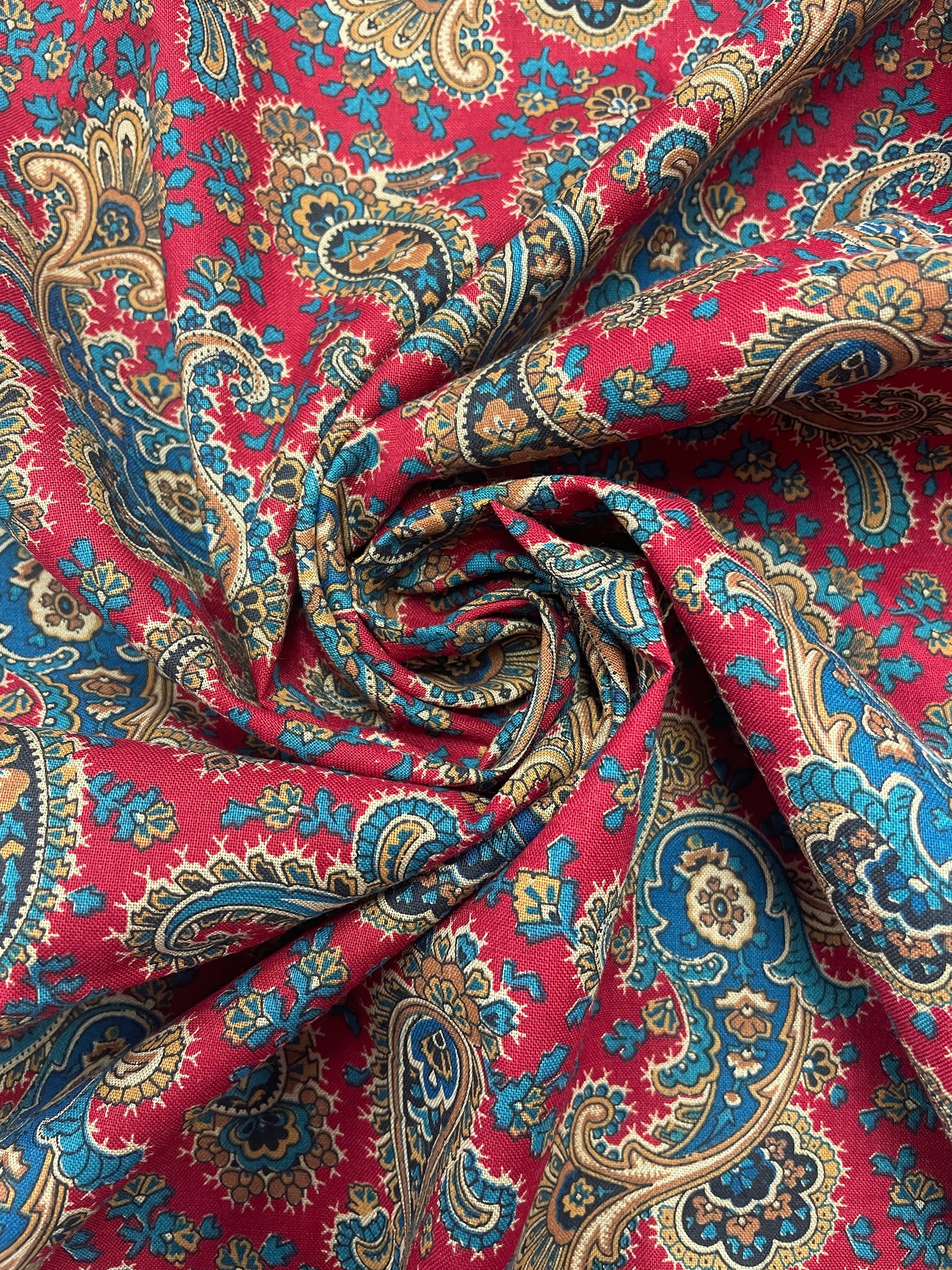 2 1/4 YD Cotton - Teal and Tan Paisley on Dark Red Background