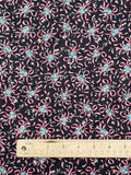 1 7/8+ YD Quilting Cotton Vintage - Blue Flowers Tied with Pink Ribbons on Black