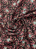 1 7/8+ YD Quilting Cotton Vintage - Blue Flowers Tied with Pink Ribbons on Black