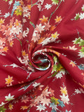1 1/8 YD Nylon - Trees with Various Colored Leaves on Dark Red