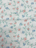 1 3/4 YD Poly/Cotton Batiste - Peach and Blue Flowers with Green Vines on Pale Blue