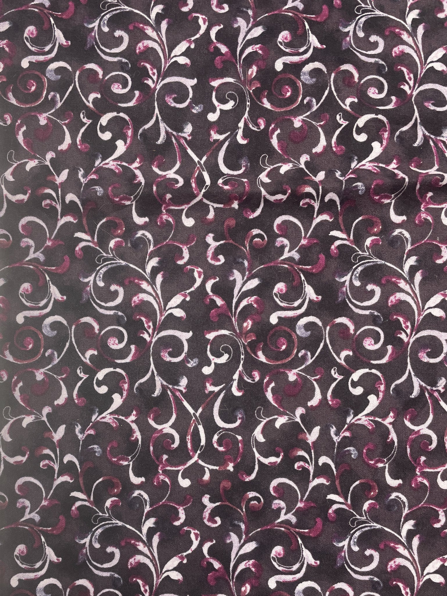 1 YD Quilting Cotton - White and Magenta Filigree on Mottled Black