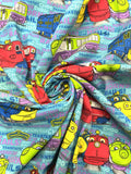 2011 1 YD Quilting Cotton - Cartoon Chuggington Trains on Turquoise