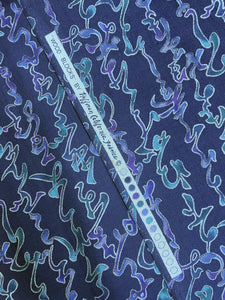 Quilting Cotton Vintage - Navy Blue with Mottled purple, Blue and teal Squiggles Outlined in Metallic Silver