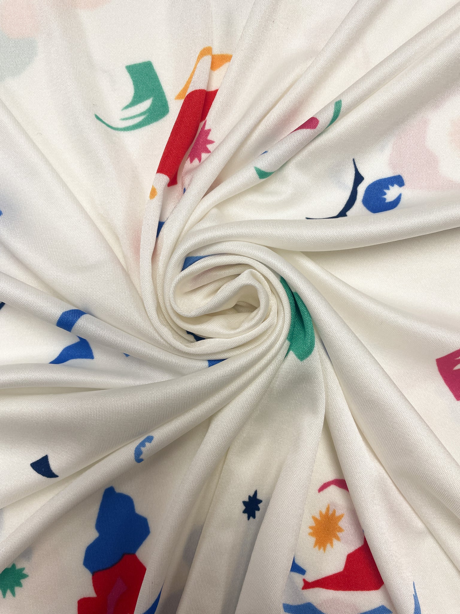 1 1/2 YD Polyester Kiana Knit Vintage - Off White with Multi Colored Graphics