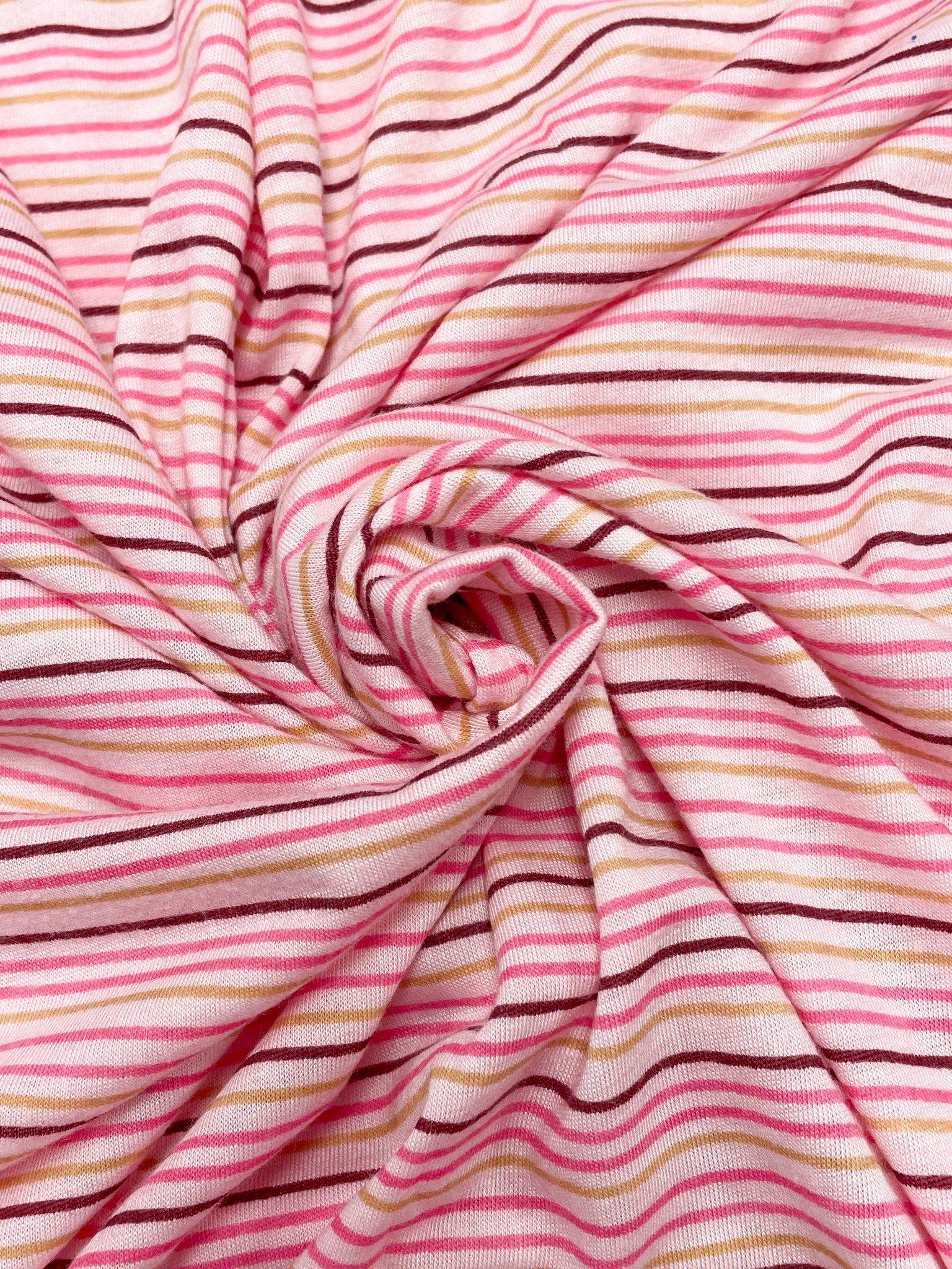 2 YD Polyester Knit - Pink with Pink, Burgundy and Golden Beige Stripes