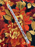 3 1/8 YD Polyester - Maroon, Orange, and Golden Yellow Flowers with Gold Glitter Accents on Black