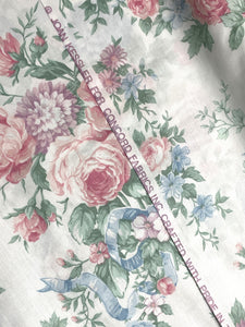 Poly/Cotton Vintage - White with Flowers in Pink, Blue and Purple with Tied in Blue Bows
