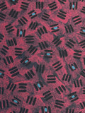 Polyester - Black with Mottled Red and Blue Dots