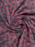Polyester - Black with Mottled Red and Blue Dots
