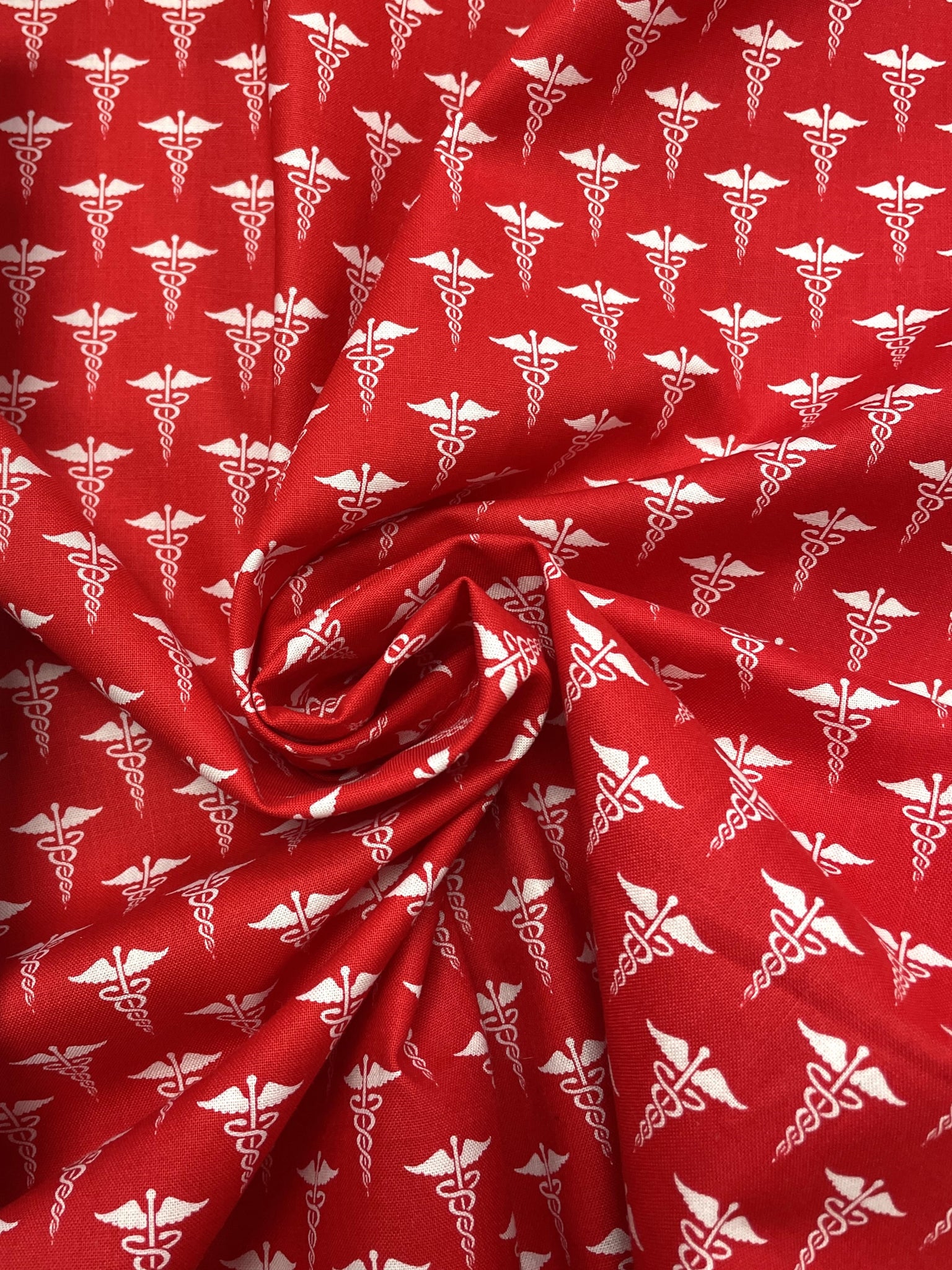 Quilting Cotton - Red with Caducei in White