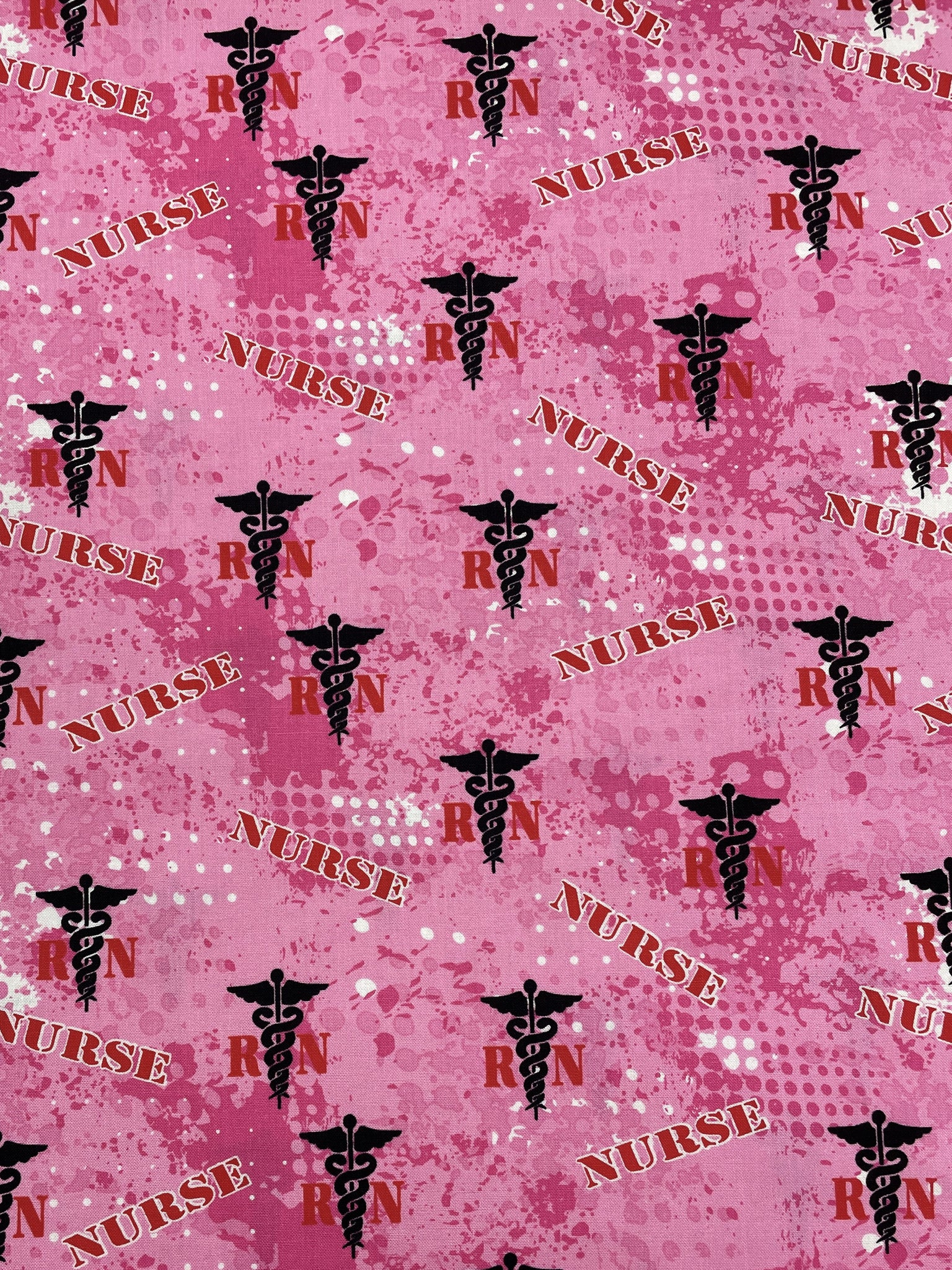 Quilting Cotton - Mottled Hot Pink with "Nurse" and "RN" in Red and Caducei in Black