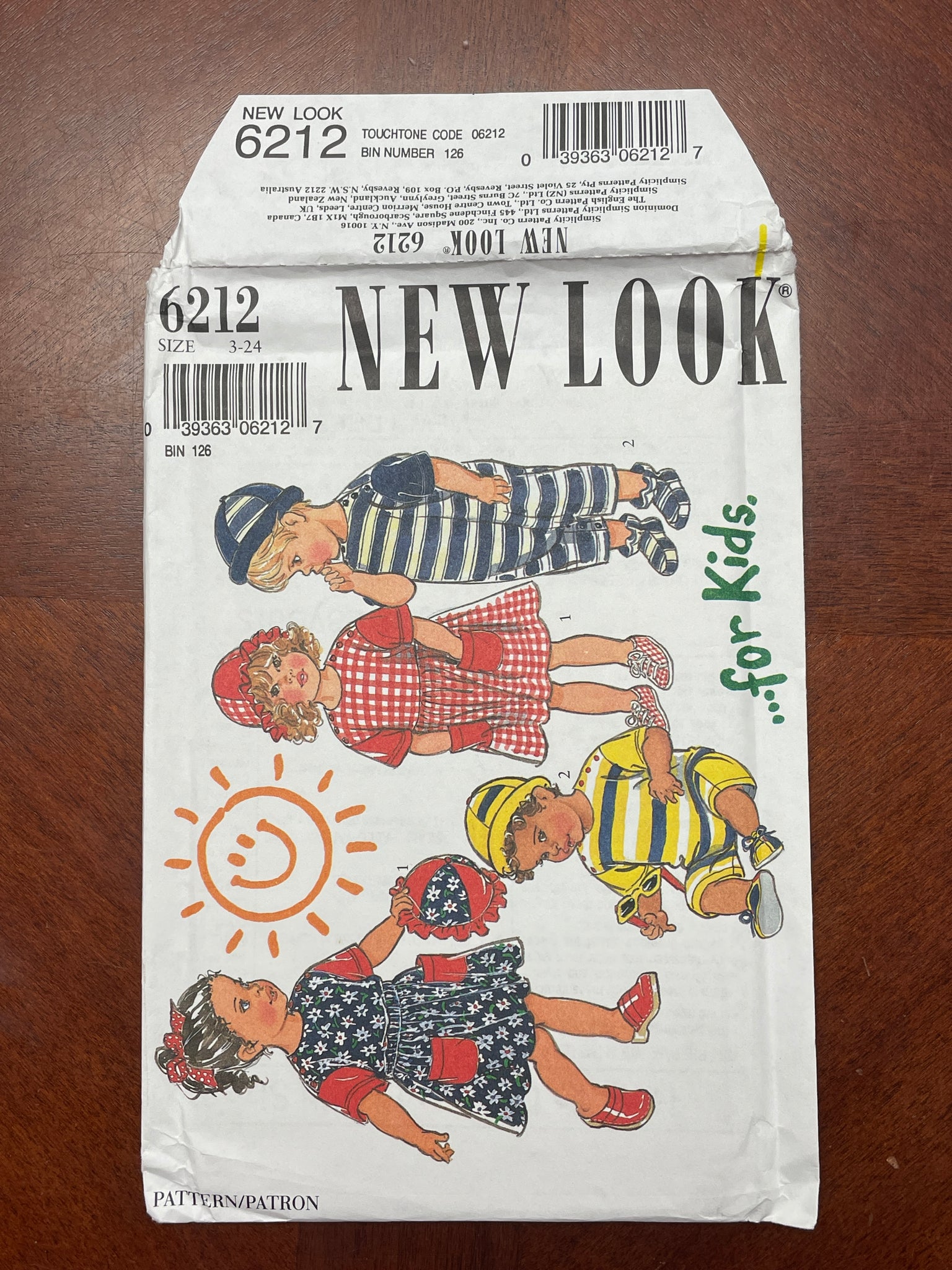 1990's New Look 6212 Pattern - Toddlers' Dress, Romper, Shirt. Skirt, Hat and Shoes FACTORY FOLDED