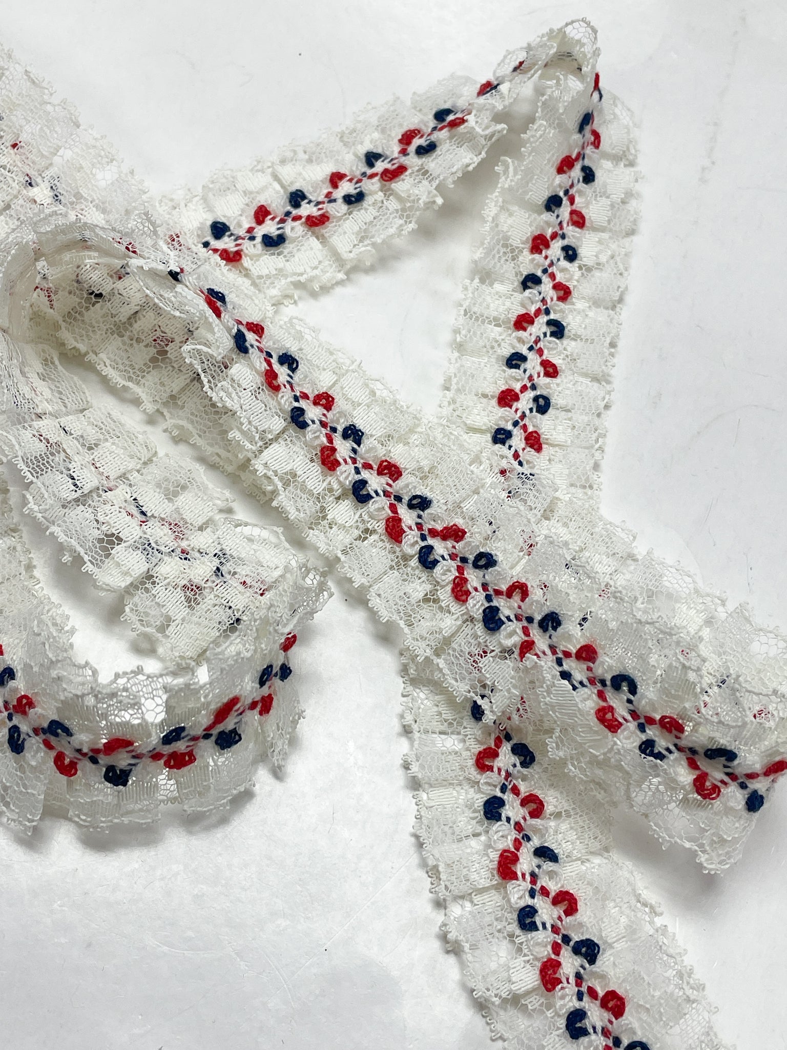 Polyester Pleated Off White Lace on Red, White and Blue Trim