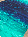 1 YD Lycra Printed Ombre - Teal to Blue with Leaves