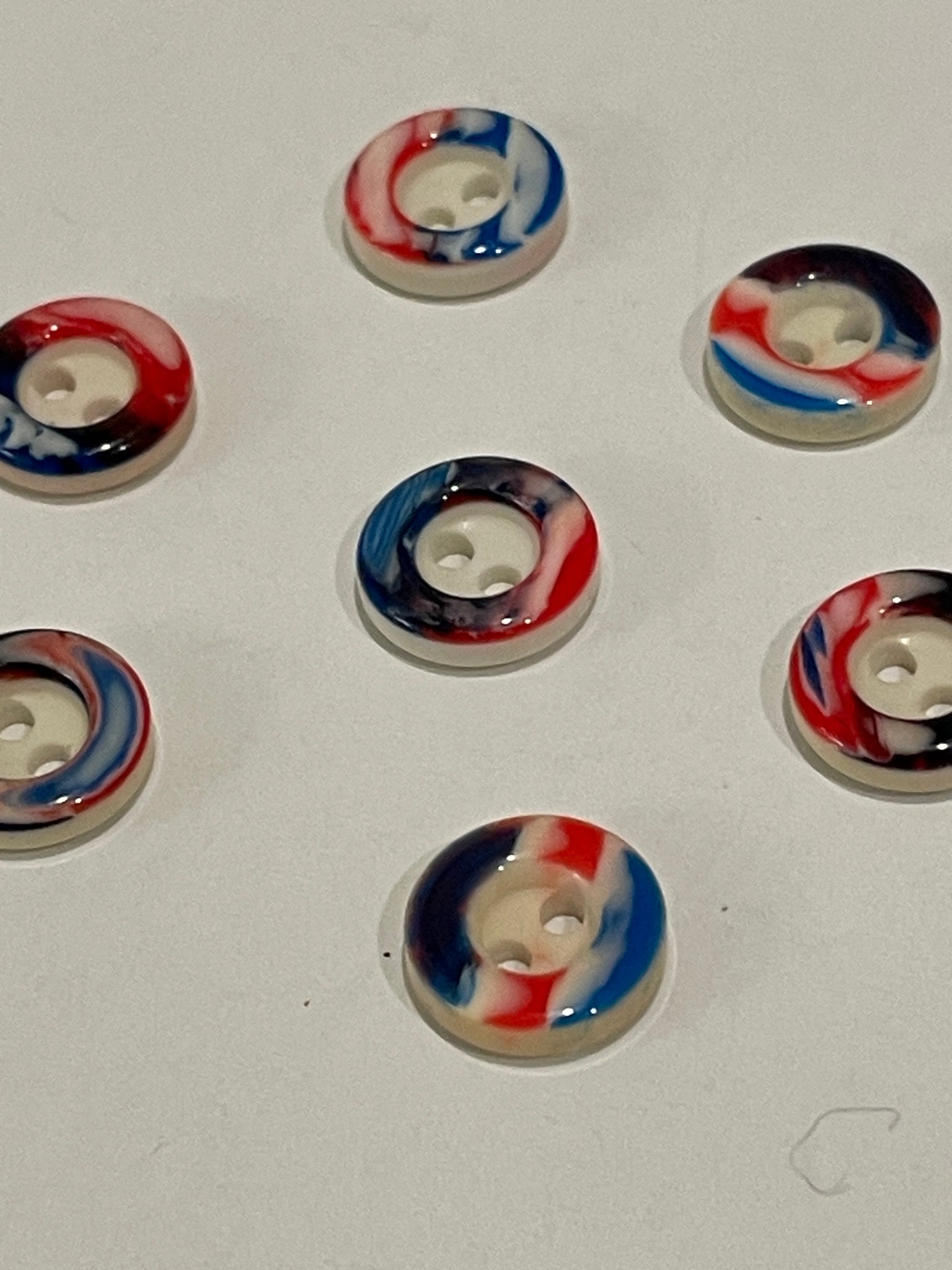 Buttons Plastic Set of 7 - White with Multi Colored Ring
