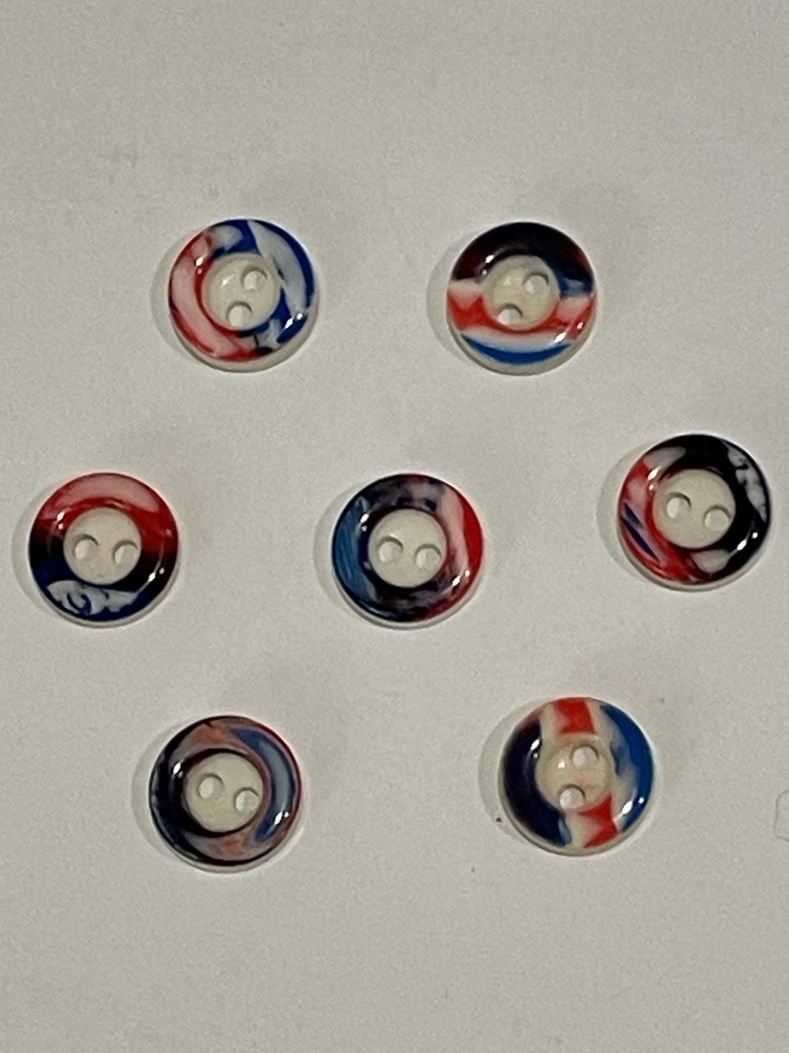 Buttons Plastic Set of 7 - White with Multi Colored Ring
