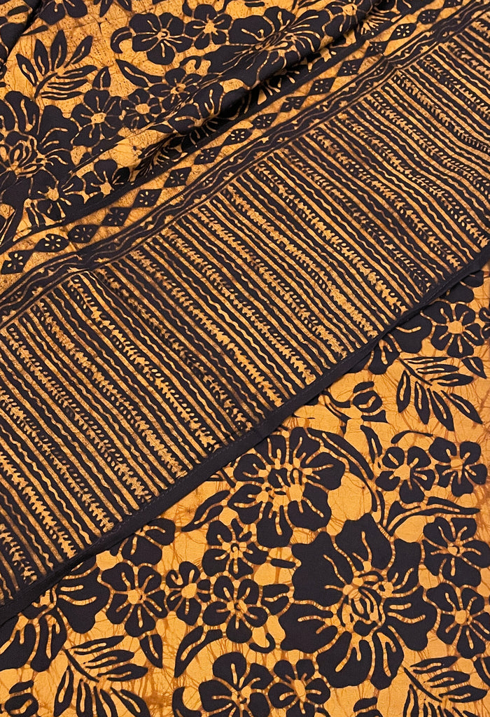 1 1/3 YD Rayon Batik - Mottled Tan with Black Floral Print, Border Cut Ends
