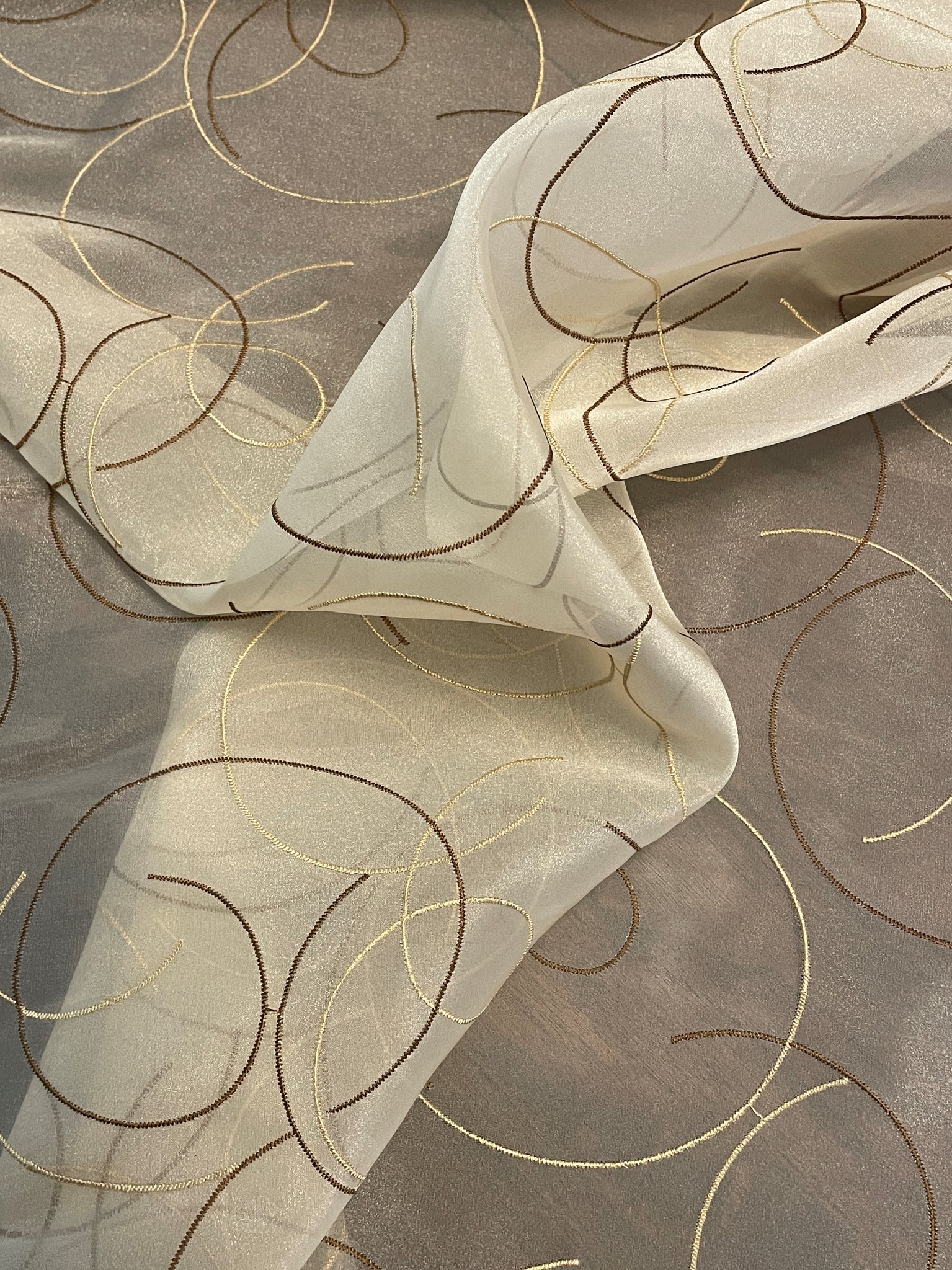 Polyester Home Dec. Embroidered Organza - Cream with Brown Curved Lines